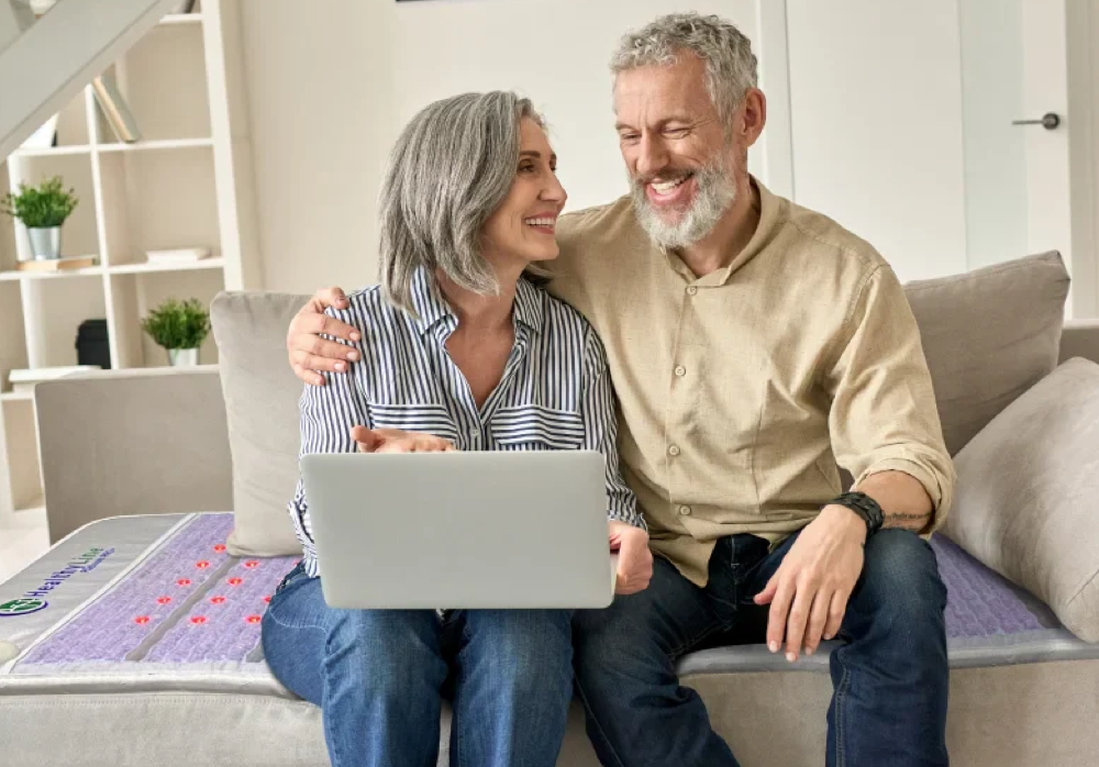 Happy couple managing osteoarthritis pain through lifestyle choices and therapies. Happy couple managing osteoarthritis pain through lifestyle choices and therapies.