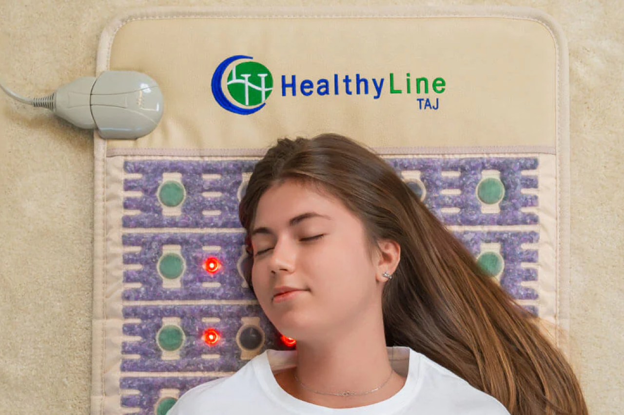Woman relaxing on a Healthyline TAJ mat