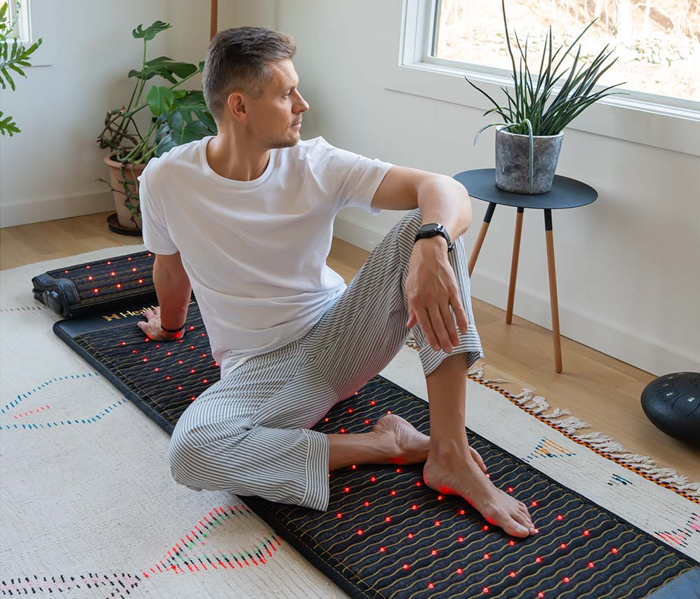 Man on a HealthyLine PEMF Jet mat for muscle recovery